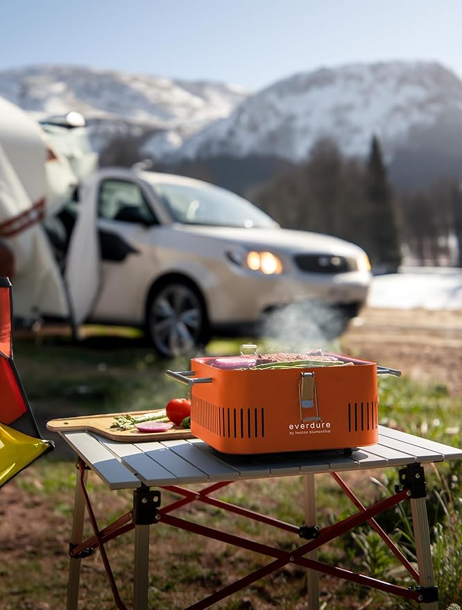 Everdure Cube Portable Charcoal Grill, Tabletop BBQ, Perfect Tailgate, Beach, Patio, or Camping Grill, Lightweight & Compact Small Grill with Preparation Board & Food Storage Tray, Orange