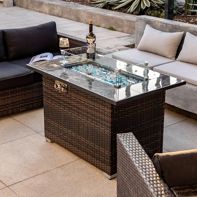 44in Outdoor Propane Gas Fire Pit Table, 50,000 BTU Auto-Ignition Gas Firepit with Glass Wind Guard, Marble Tile Tabletop, Mixed Color Glass Rocks, Brown PE Rattan