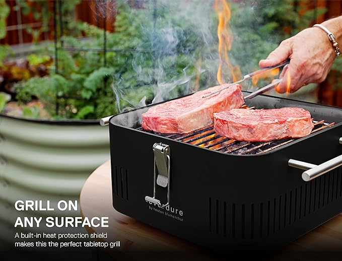 Everdure Cube Portable Charcoal Grill, Tabletop BBQ, Perfect Tailgate, Beach, Patio, or Camping Grill, Lightweight & Compact Small Grill with Preparation Board & Food Storage Tray, Orange